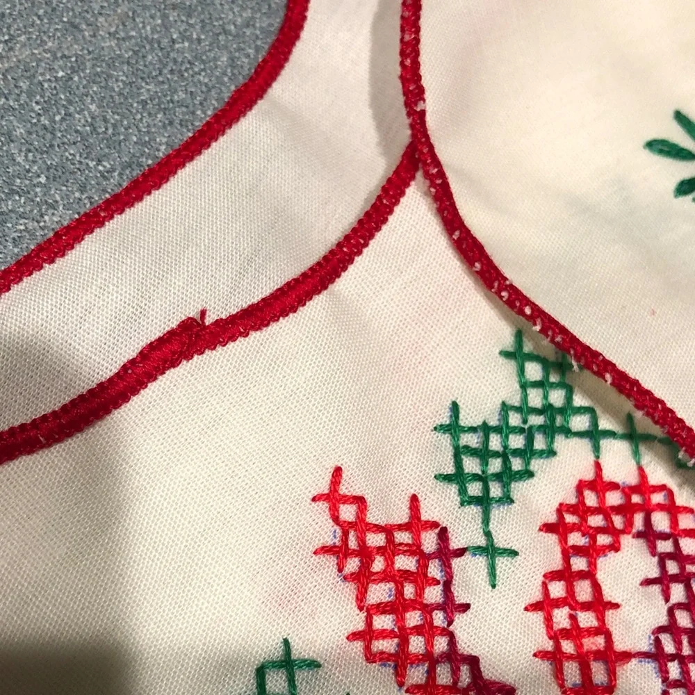Embroidered Table Linens with Red Trim